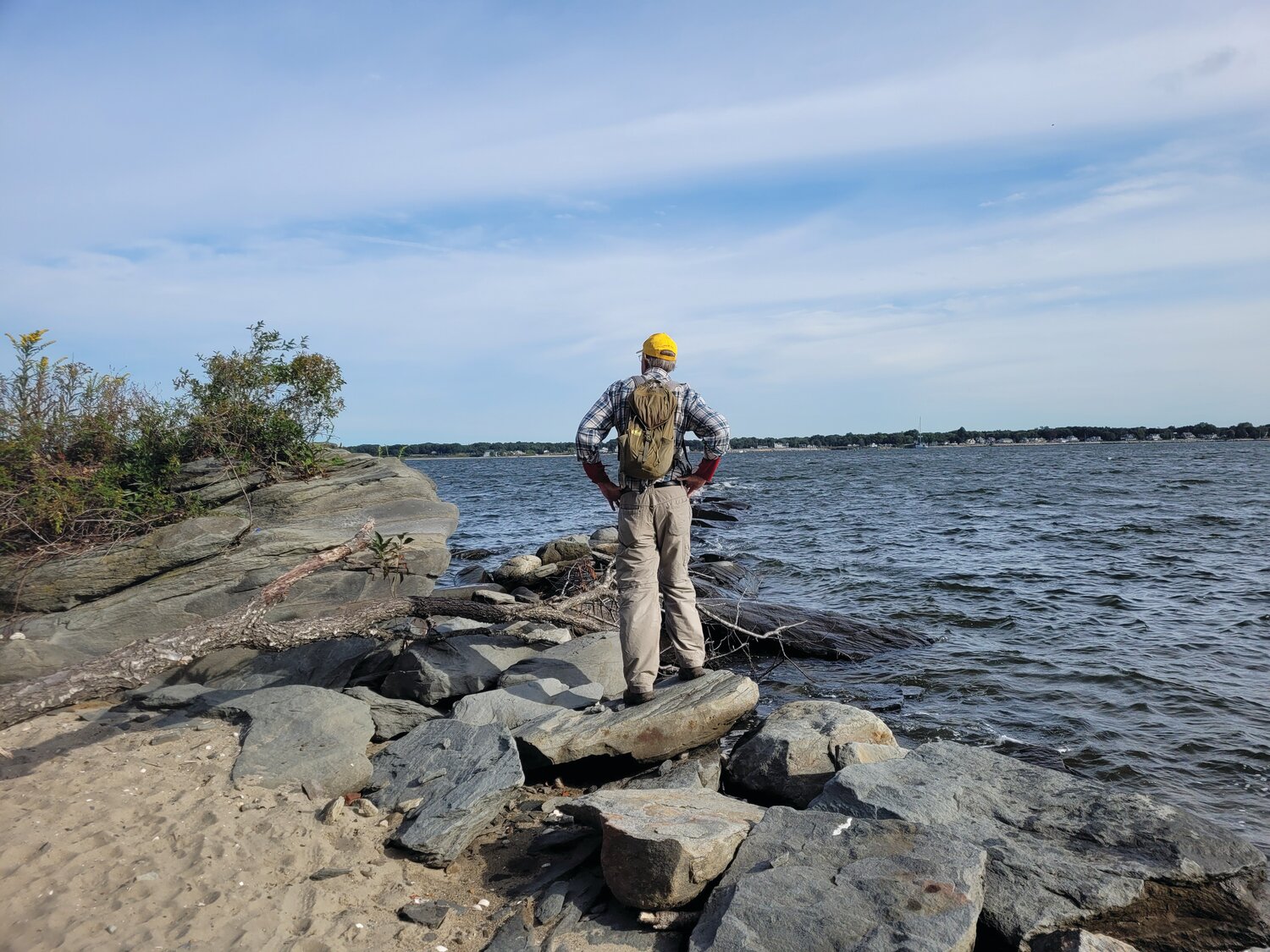 SEAPLANE SALLY: John Kostrzewa approaches the Sally Rocks, which stretch from the Goddard Memorial State Park beach in Warwick and into Greenwich Bay. The author discovered a WWI seaplane manufacturer set up operations a century ago on Chepiwanoxet Point.